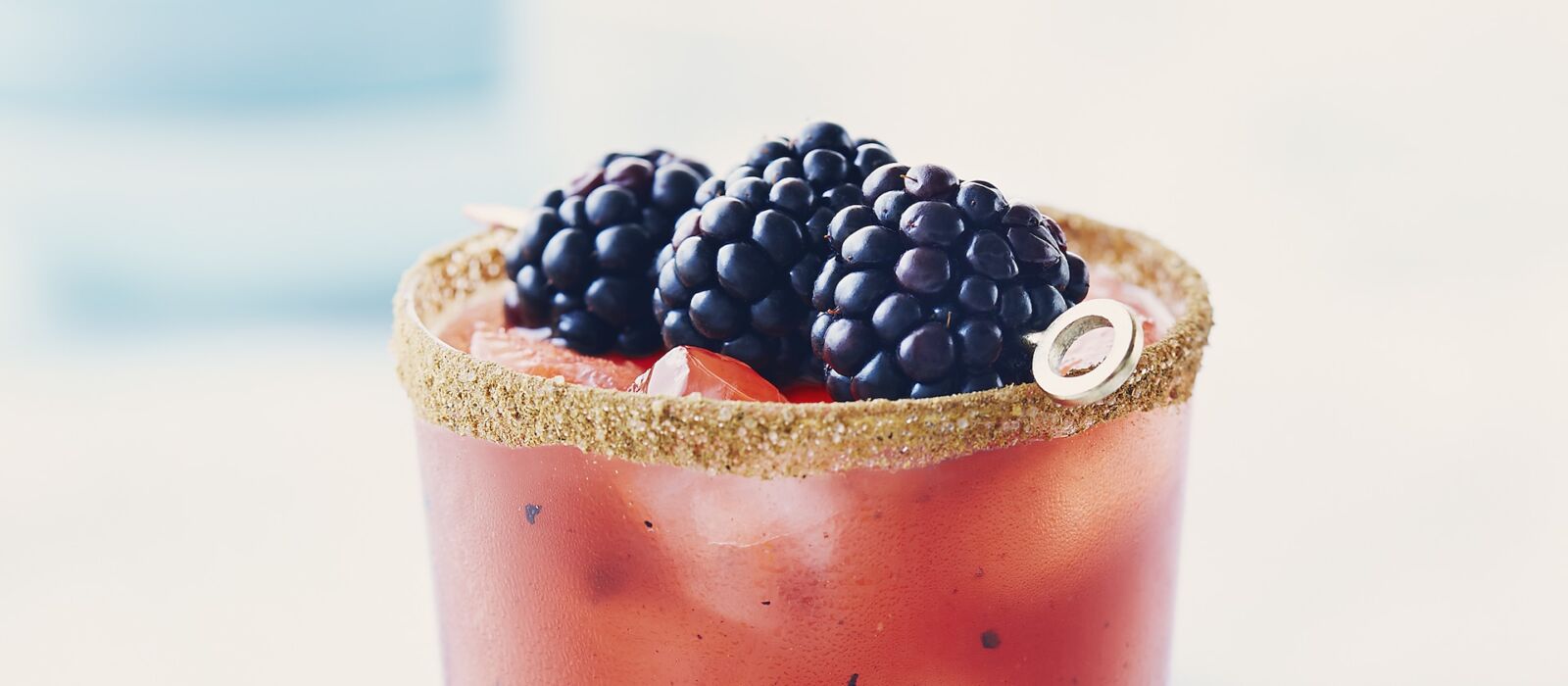 Caesar drink with blackberry garnish